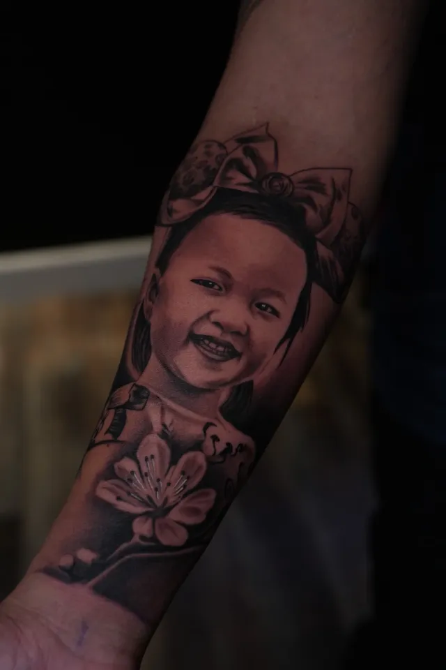 Baby portrait tattoo