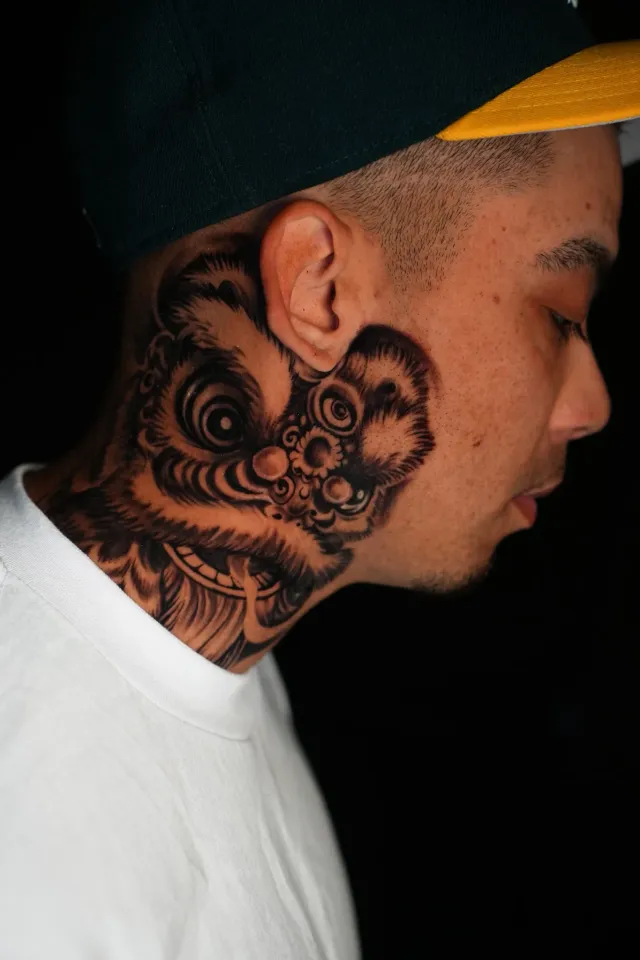 Neck script tattoo