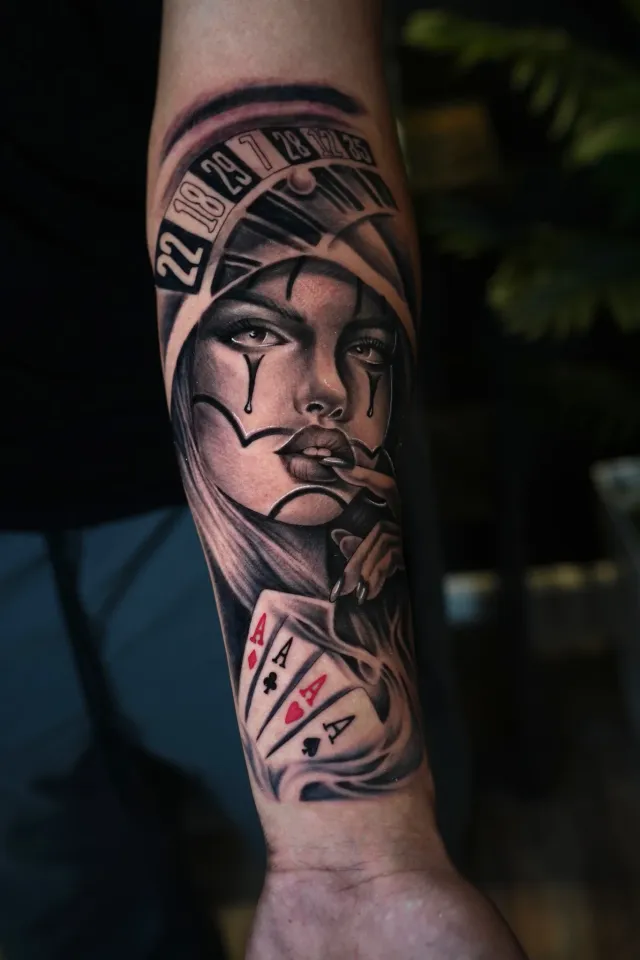 Egyptian queen playing card tattoo