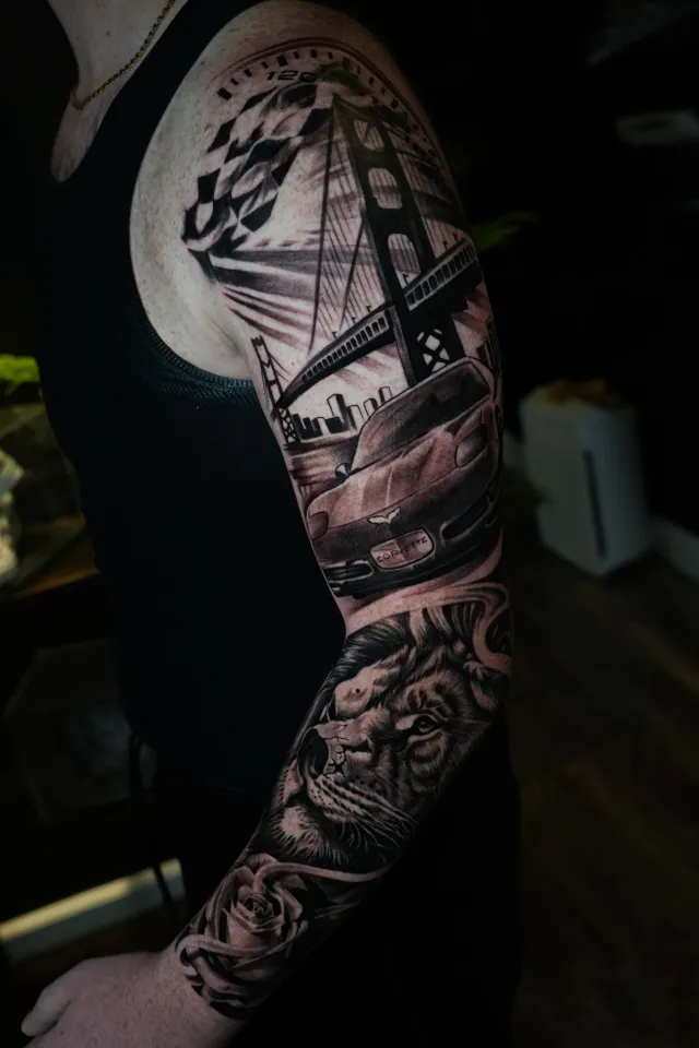 Architecture and film strip sleeve tattoo