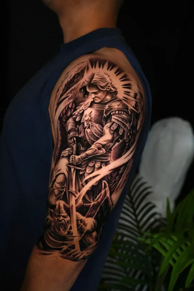 Statue of Liberty upper arm tattoo