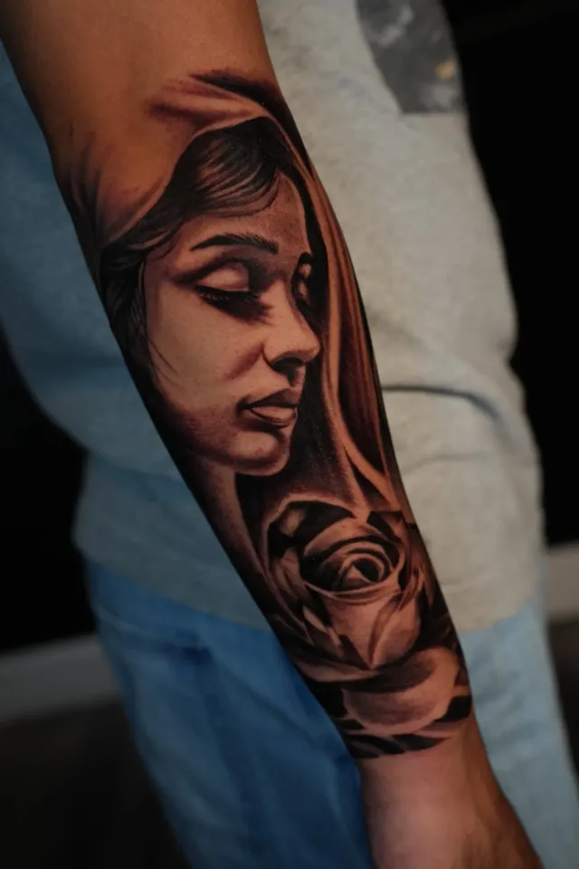 Veiled woman portrait tattoo