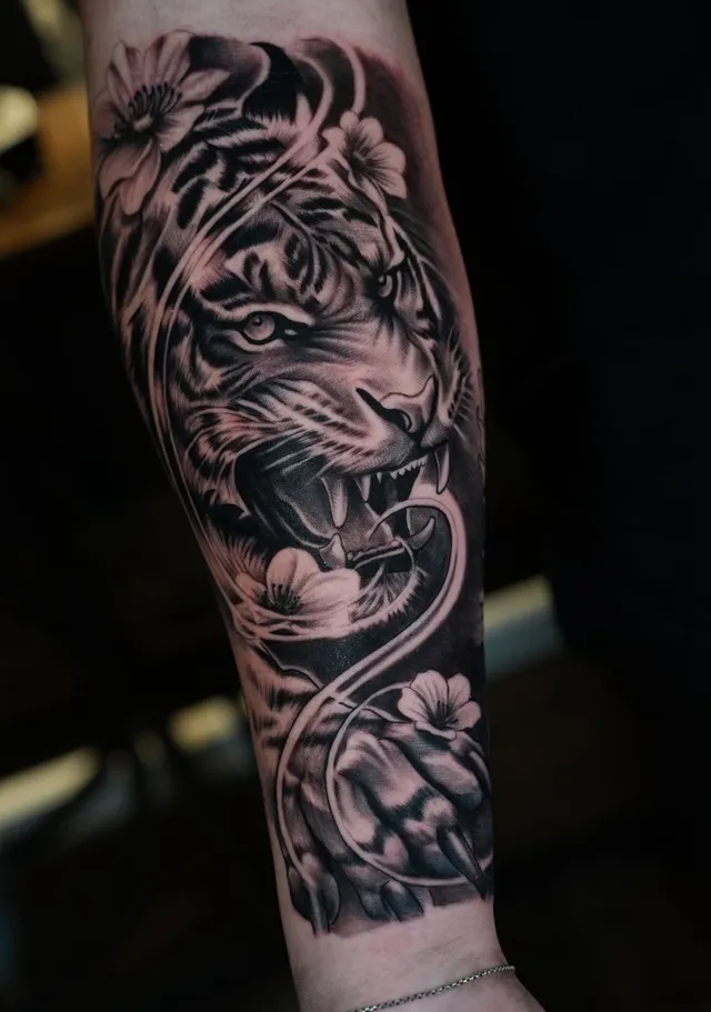 Tiger and floral black and grey realism tattoo