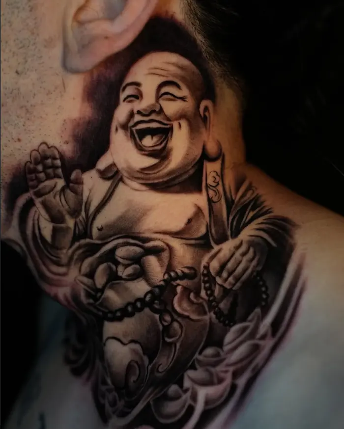 Laughing Buddha black and grey realism tattoo by BillyDaKid