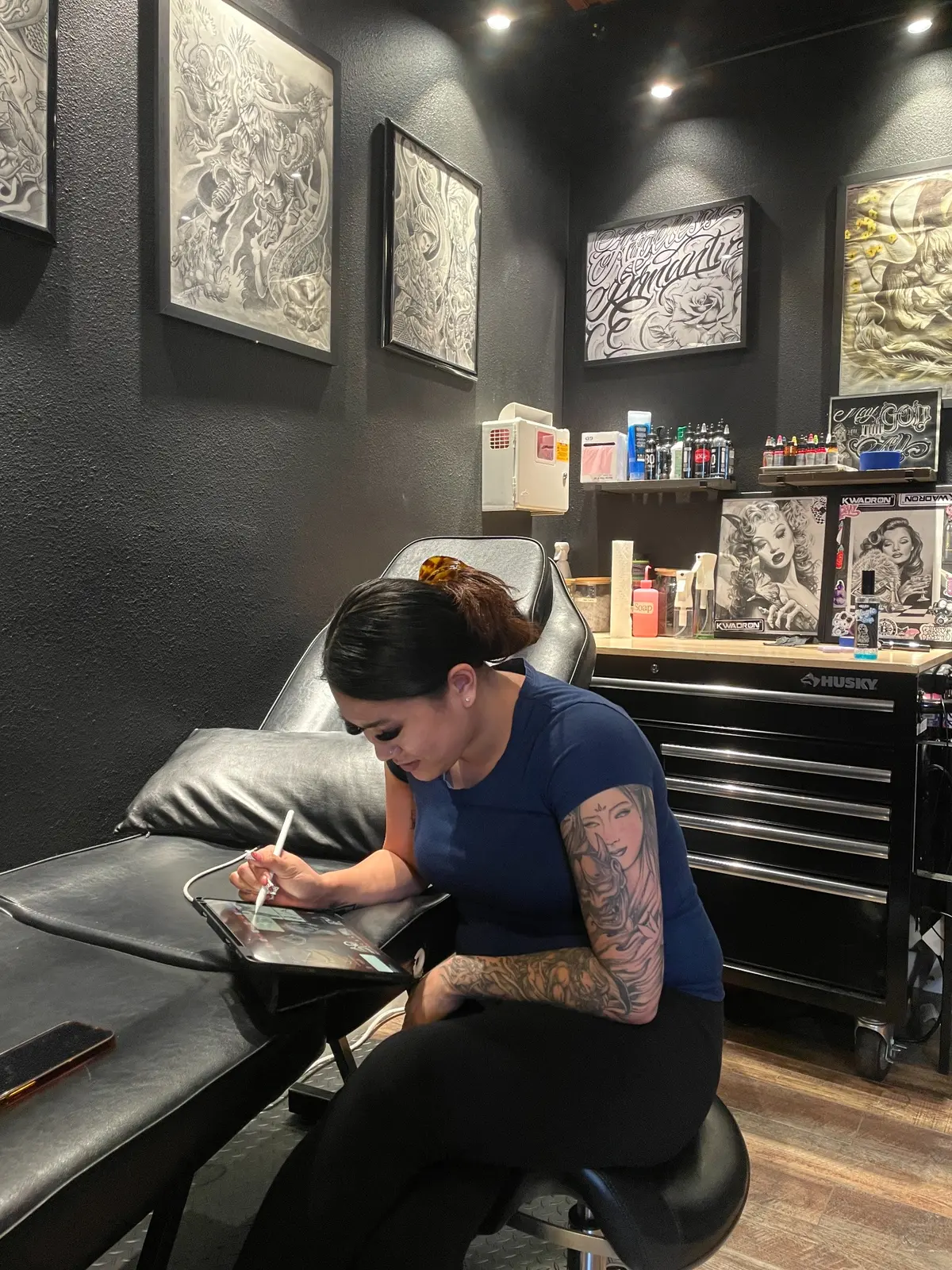 Tiffany Tiffy working inside Tattoo Nerds