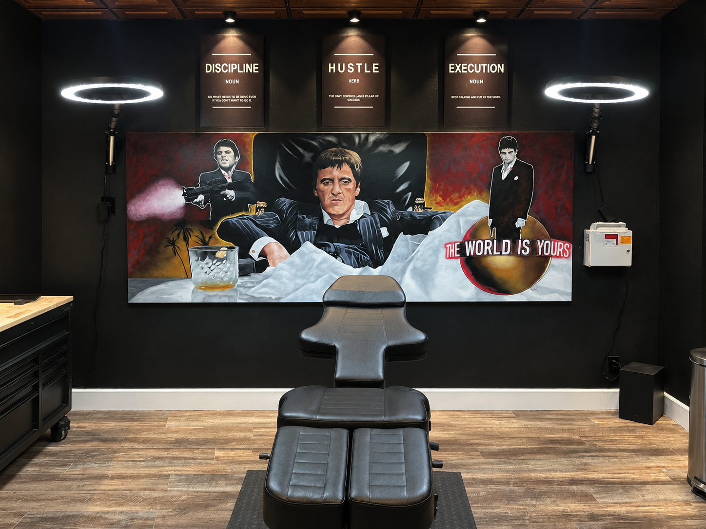 Tattoo Nerds feature station with a custom Scarface mural and professional lighting
